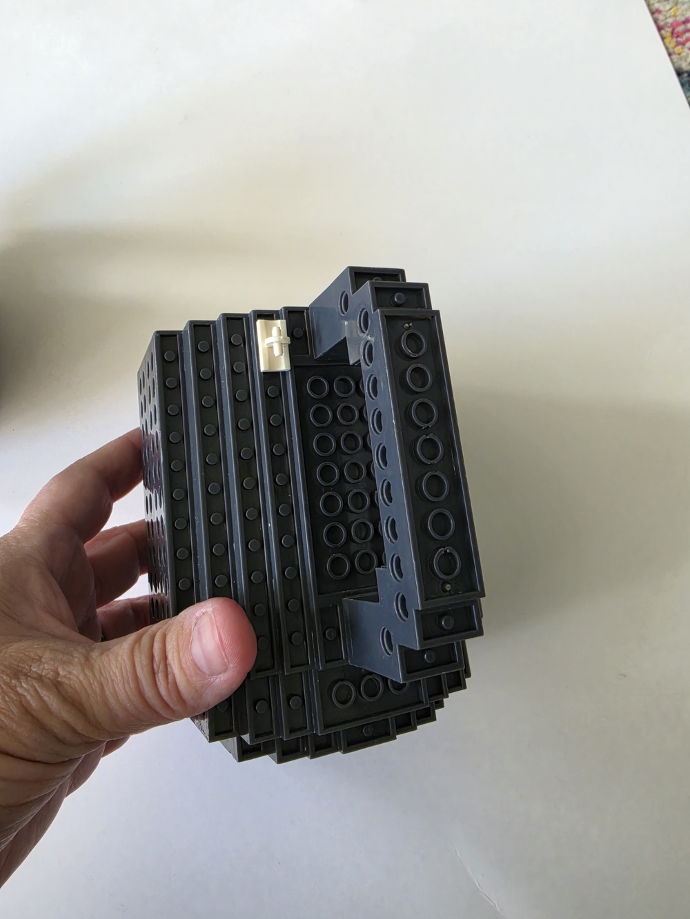 build-on brick mug, a novelty coffee cup. Gray